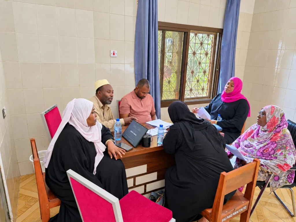 ZGC members discussing priorities in a small group during the network-strengthening project